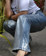 Jeans flare con foil efecto PLATEADO