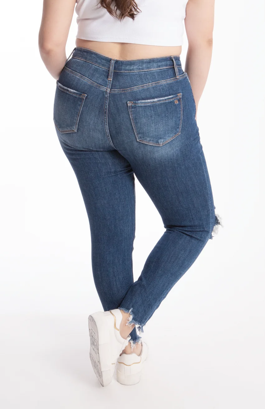 Jeans skinny con rotura