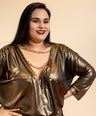 Blusa con efecto brilloso