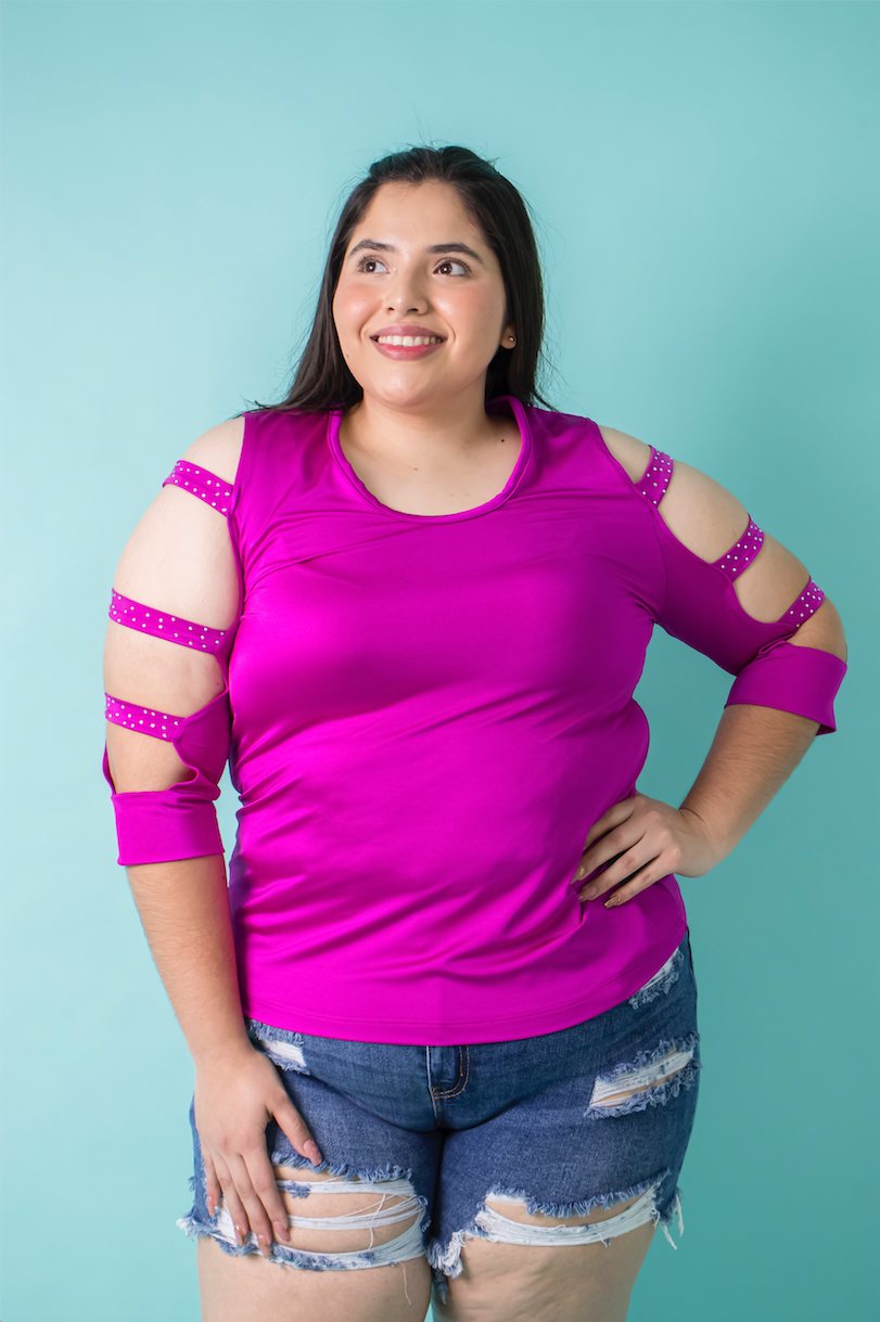 Blusa satinada con pedrería