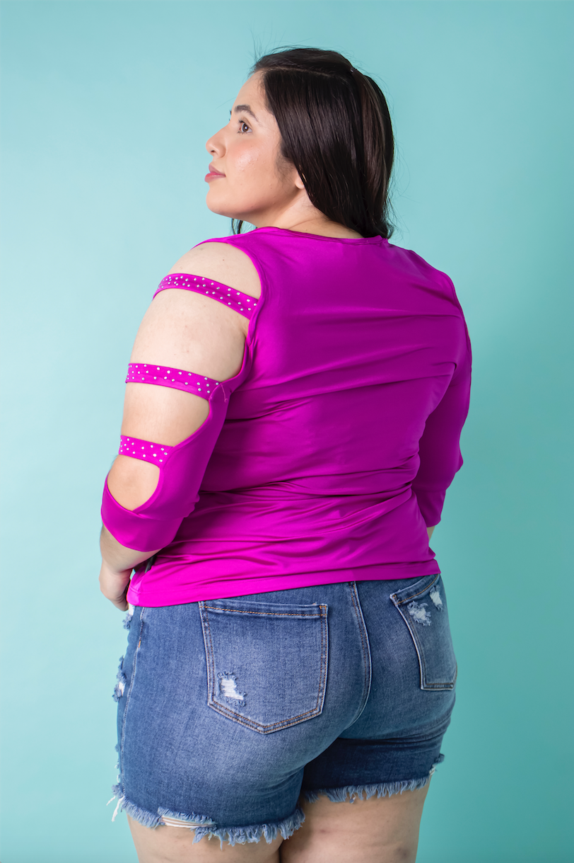 Blusa satinada con pedrería