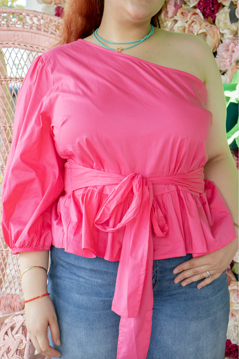 Blusa pemplum con una manga