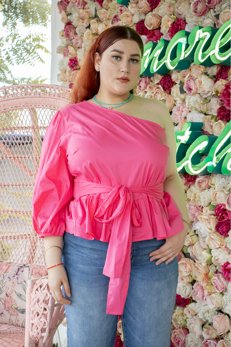 Blusa pemplum con una manga