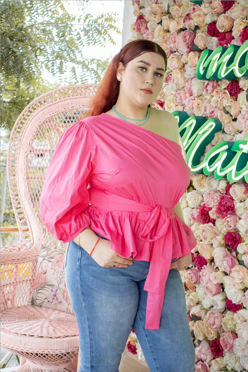 Blusa pemplum con una manga