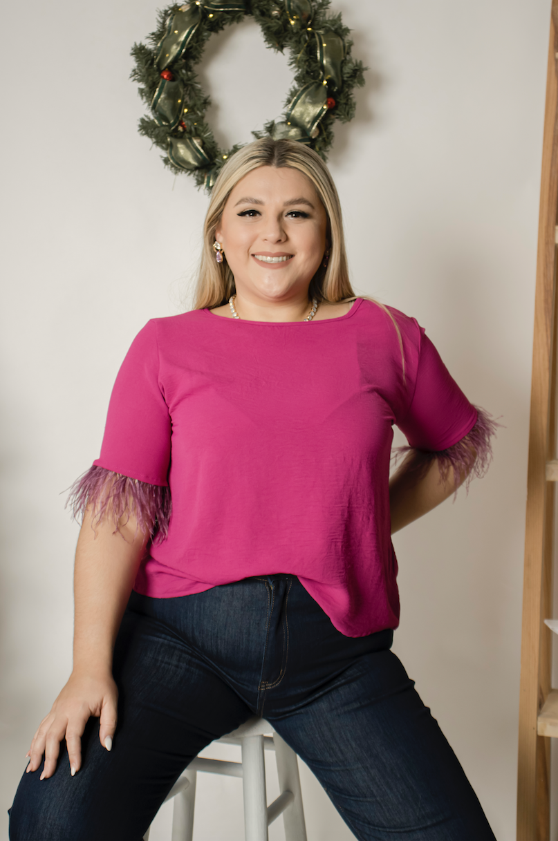 Blusa manga corta con plumas