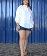 Blusa camisera con botón de perlas