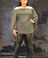 Blusa brillosa off the shoulders