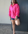 Blusa camisera con botón de perlas