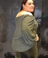 Blusa brillosa off the shoulders