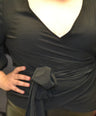 Blusa pemplum con laso