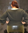 Blusa pemplum con laso