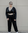 Blusa tipo croptop brillosa