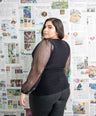 Blusa manga larga mesh con brillo