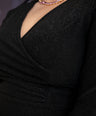 Blusa pemplum tela brillosa