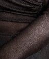 Blusa tela brillosa semitransparente