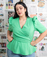 Blusa pemplum con lazo