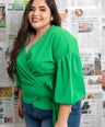 Blusa manga abullonada con lazo