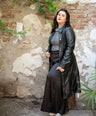 Blusa brillosa cuello alto
