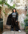 Blusa brillosa cuello alto