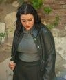 Blusa brillosa cuello alto