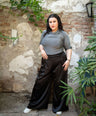 Blusa brillosa cuello alto