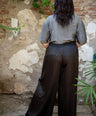 Blusa brillosa cuello alto