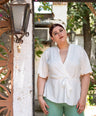 Blusa pemplum con lazo