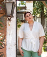 Blusa pemplum con lazo
