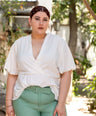 Blusa pemplum con lazo