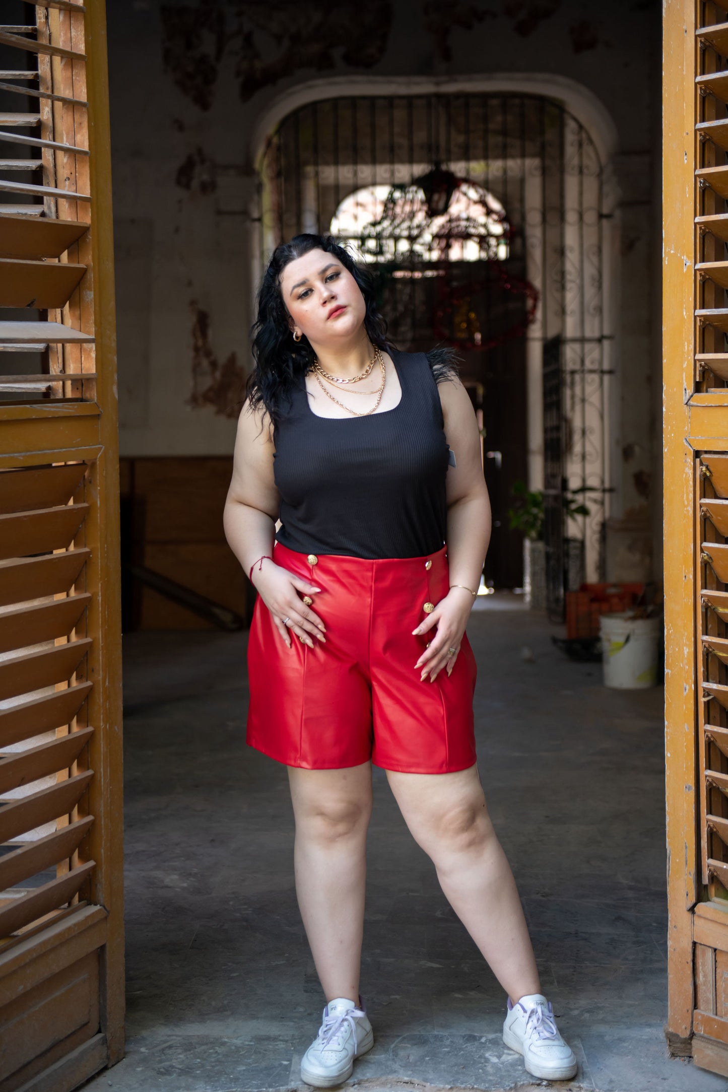 Blusa de tirante con plumas