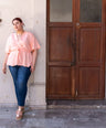 Blusa pemplum con lazo