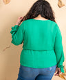 Blusa manga larga con abertura