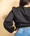 Blusa tipo croptop manga larga